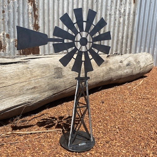 Southern Cross Windmill 3d Metal Garden Art - Raw Finish - Left Facing in Garden on Angle