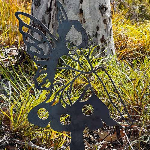 Fairy Metal Garden Stake in Bush Setting Close Up