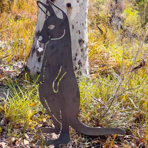 Joey Metal Garden Stake in Bush Setting Close Up