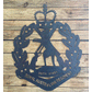 Royal Australian Regiment Metal Badge Raw Finish Wooden Background