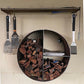 Small round 3 compartment raw steel wood holder for newspaper kindling and firewood on Wall