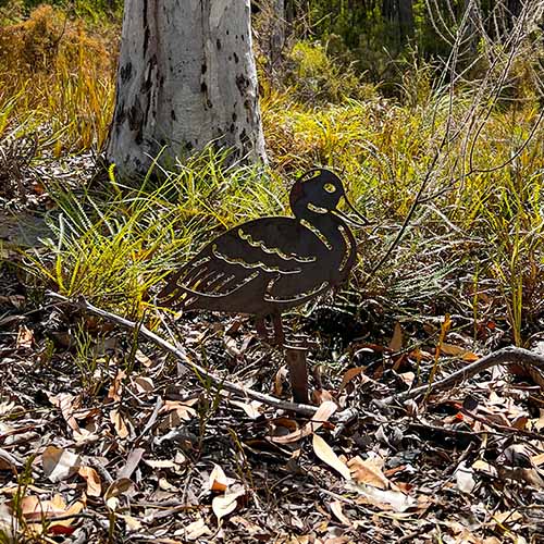 Mother Duck Metal Garden Art in Bush Setting